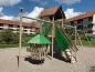 Preview: Lumka climbing side play structure with a swinging jungle hut on a playground Preview: Lumka climbing side play structure with a swinging jungle hut on a playground